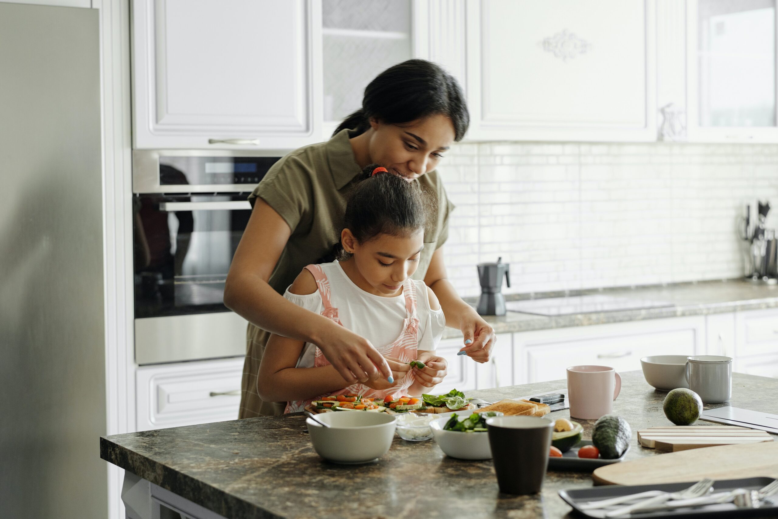 family cooking nutrient dense food together